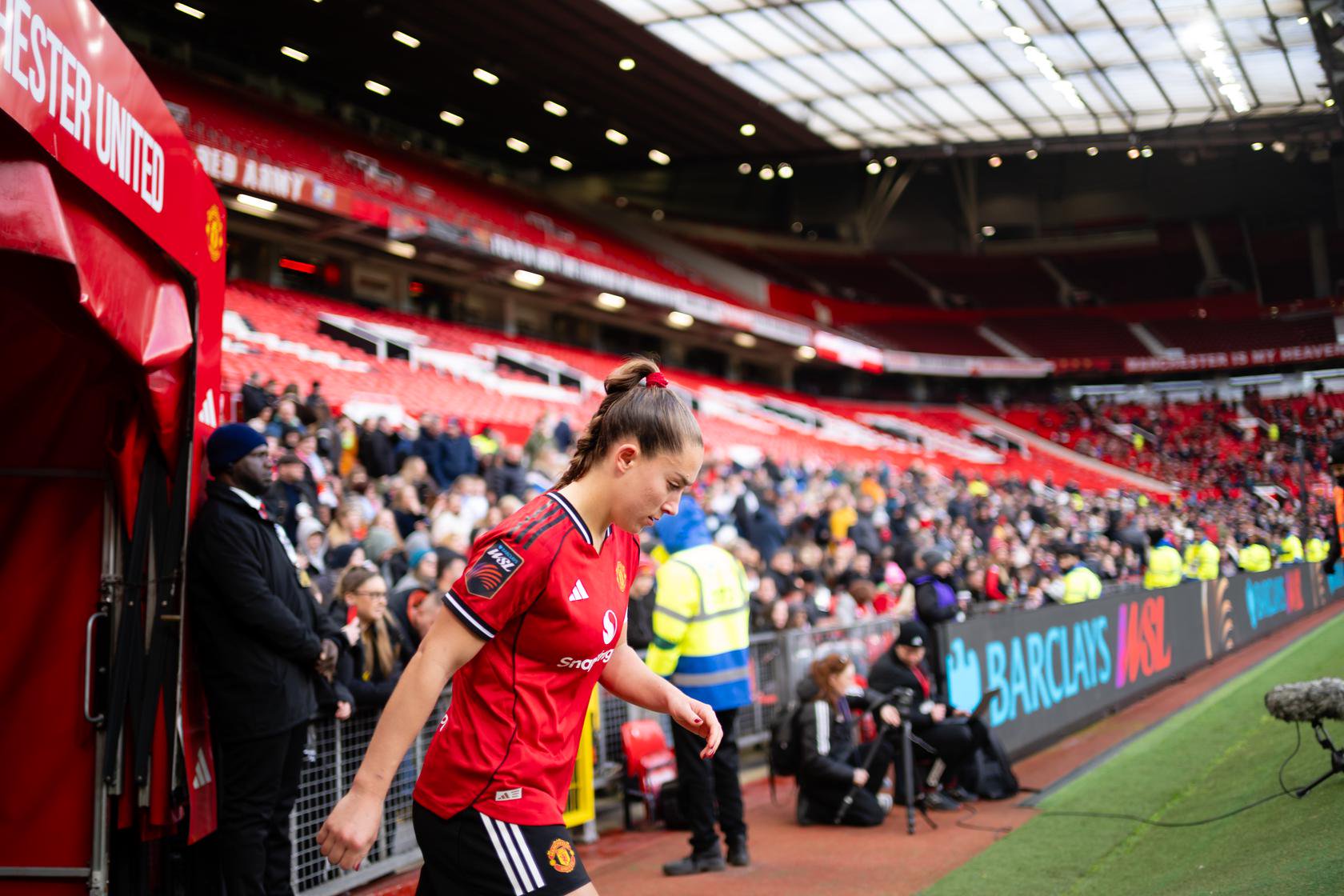 Maya Le Tissier emerging from Old Trafford tunnel
