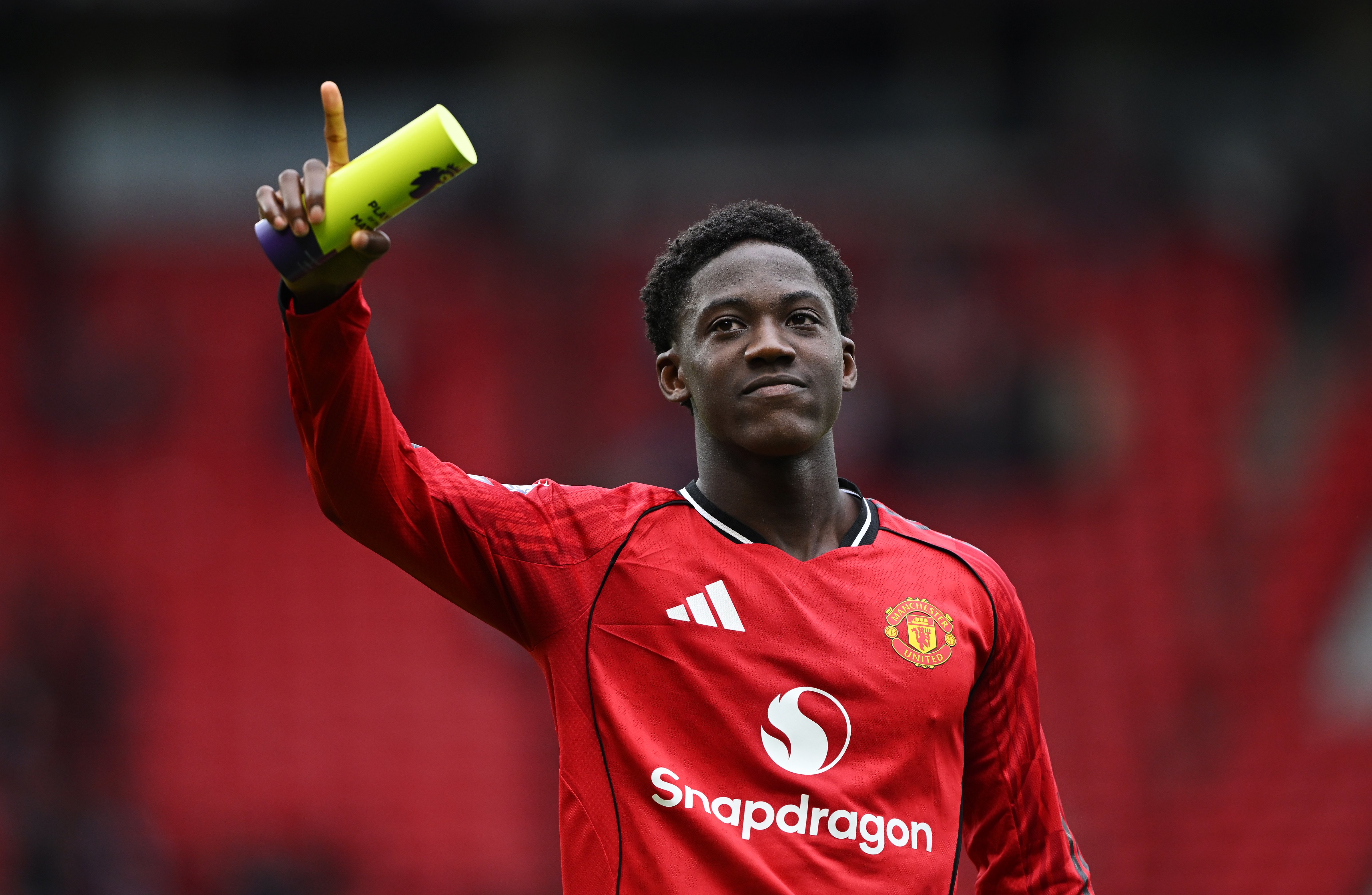 Image: Kobbie with MOTM award after Liverpool