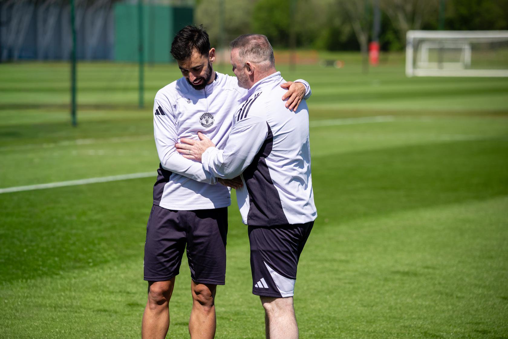 Bruno Fernandes and Wayne Rooney