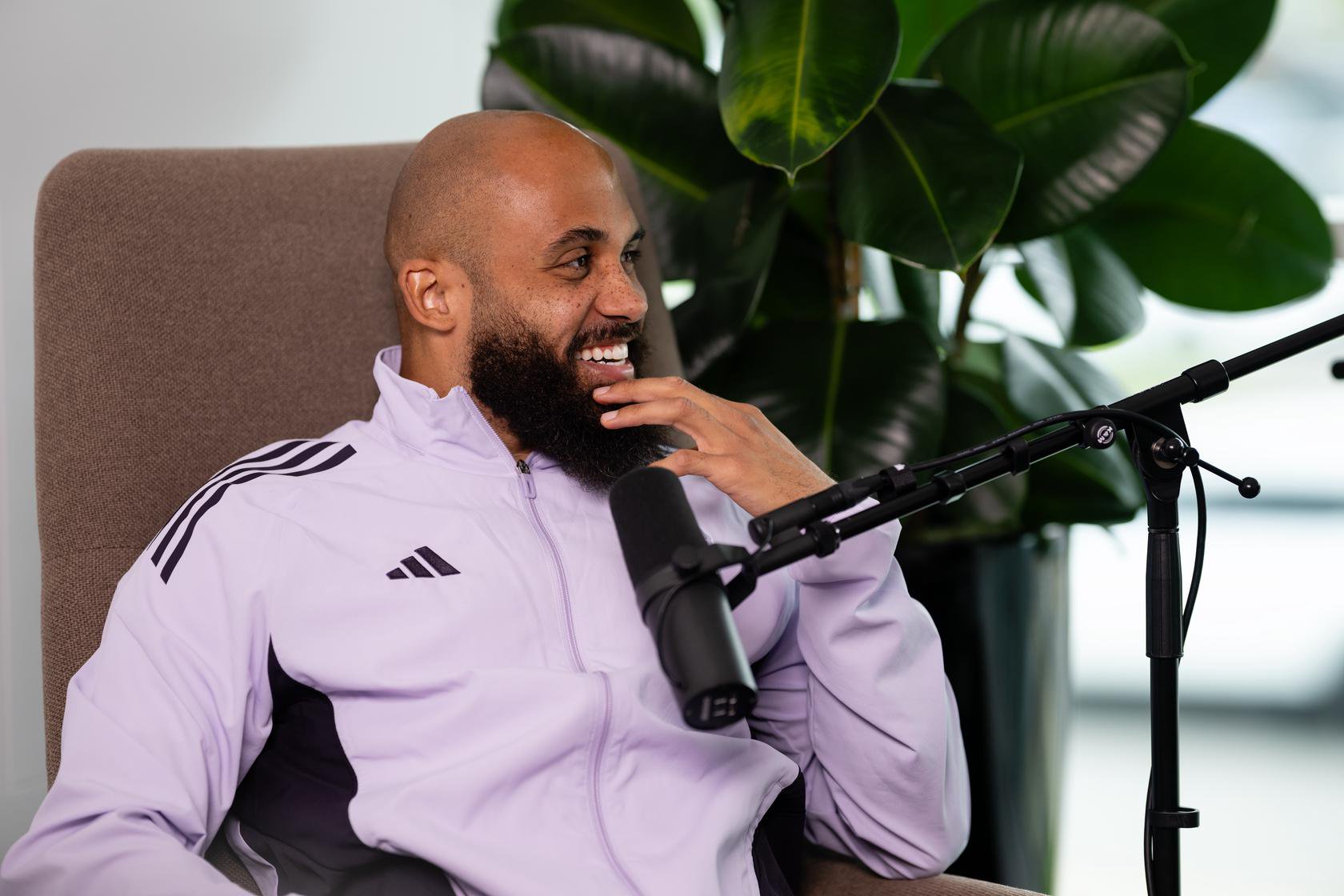 Bryan Mbeumo smiling with hand on face during Inside Carrington podcast | May 2026