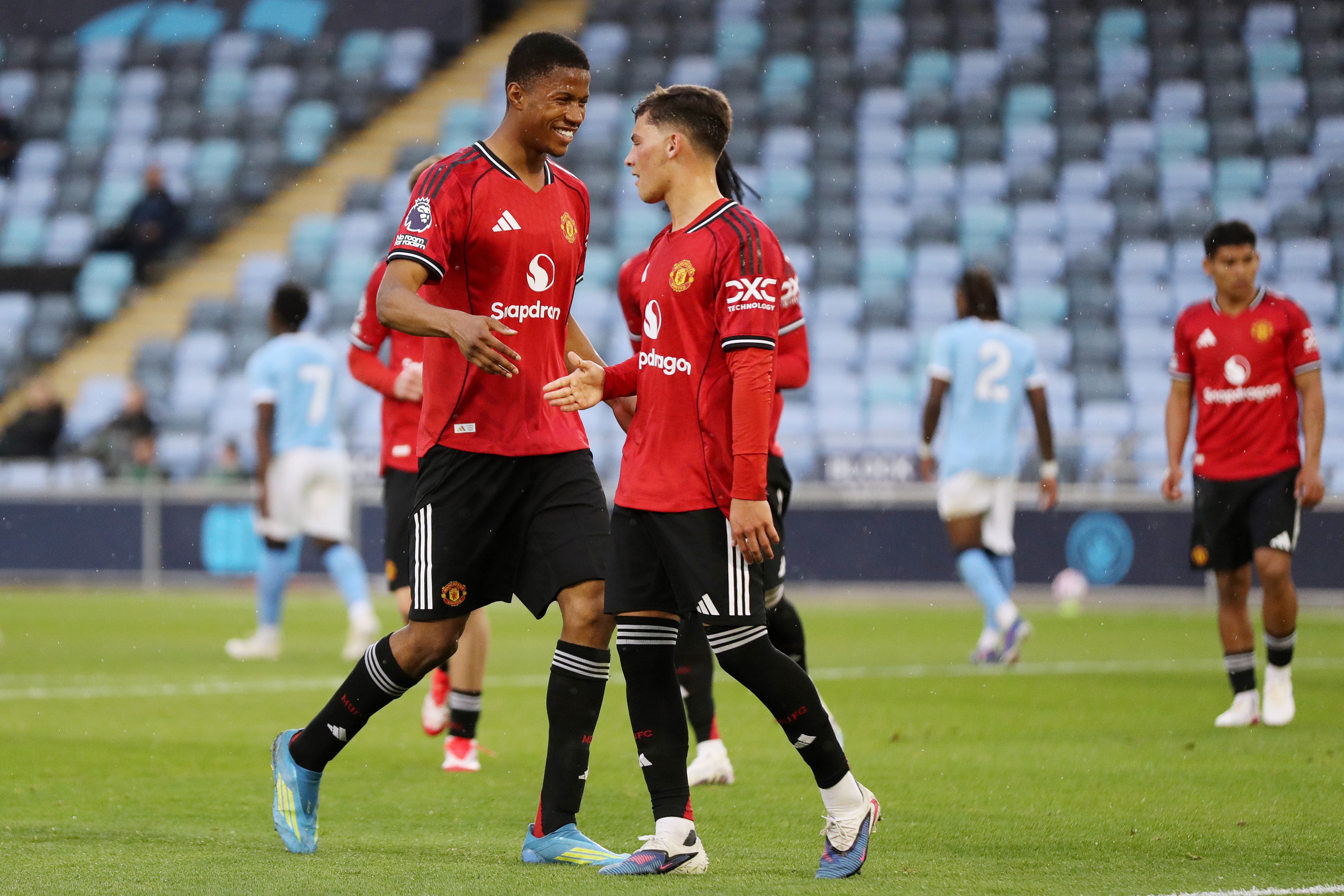 Chido Obi celebrates scoring for U21s against Manchester City
