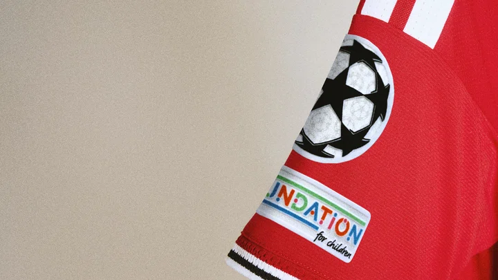 Champions League badge on new 2026/27 home shirt