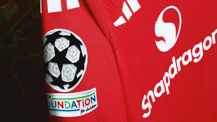 Image: Champions League logo on Man Utd shirt
