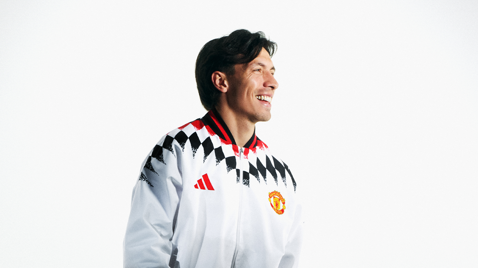 Lisandro Martinez in white track top