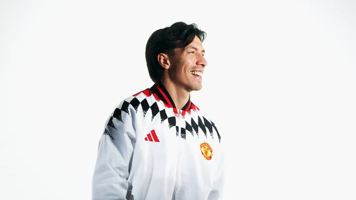 Lisandro Martinez in white track top