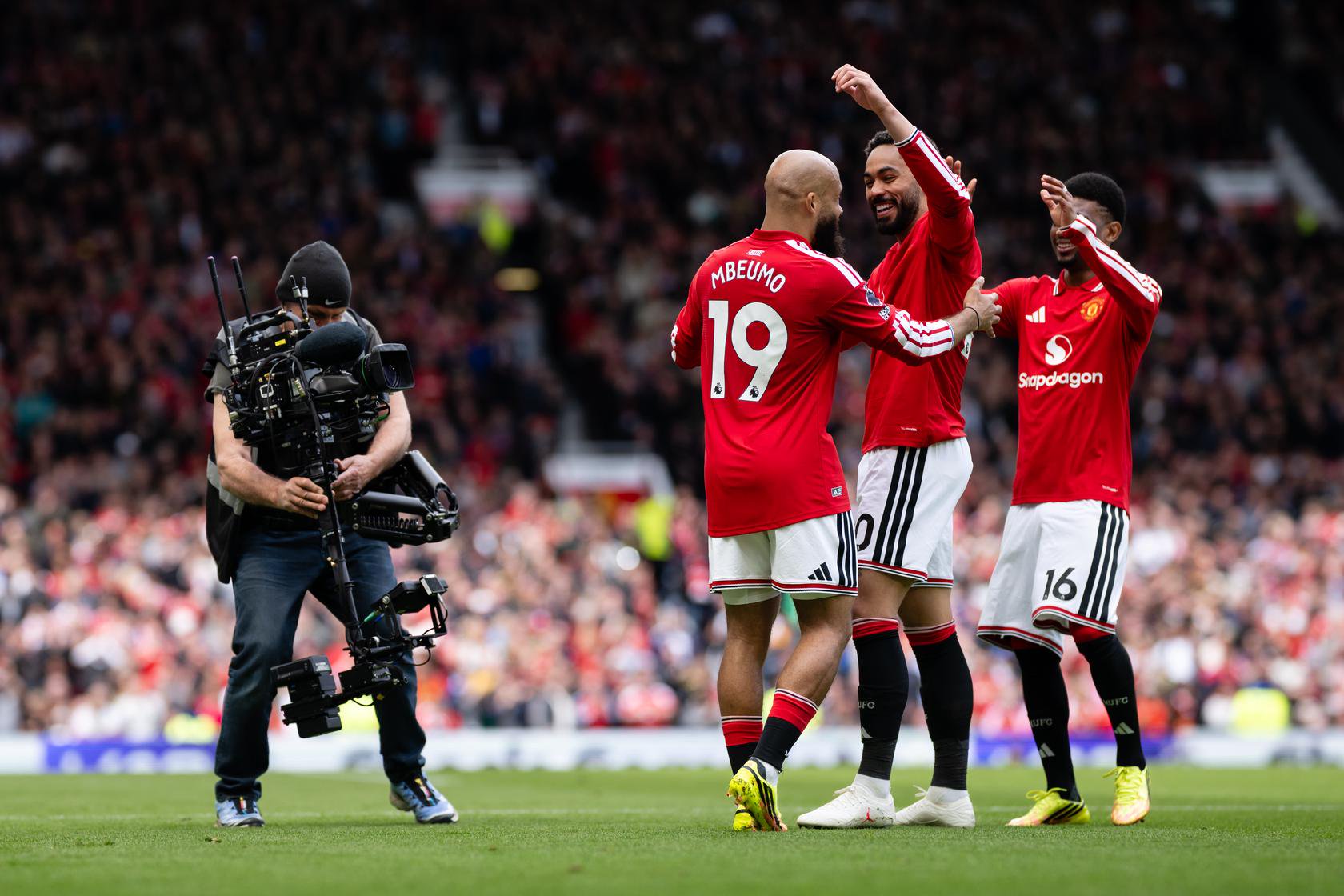 Image of Bryan Mbeumo celebrating with Matheus Cunha v Forest | 17 May 2026
