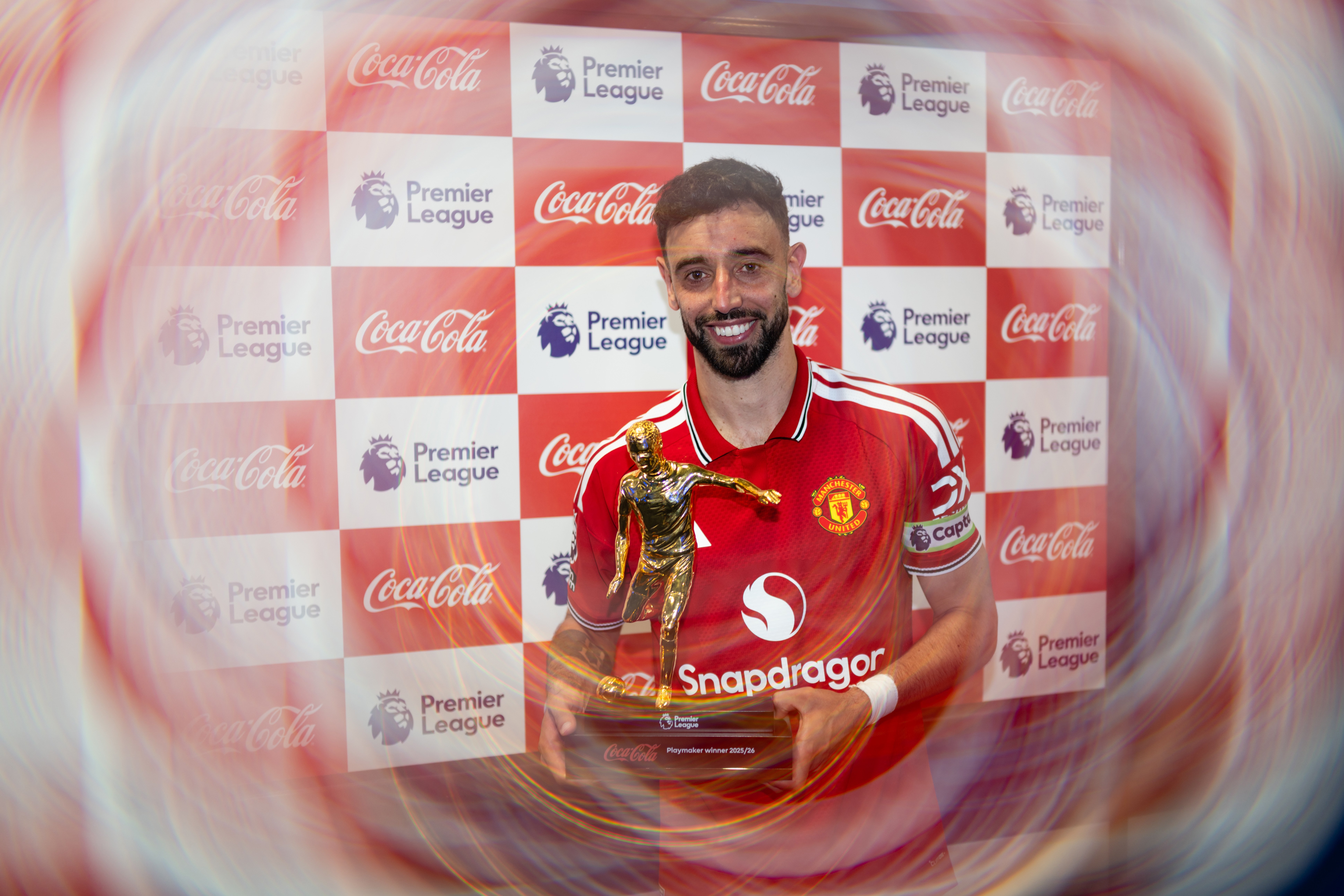 Bruno Fernandes poses with Premier League Playmaker award 2025/26