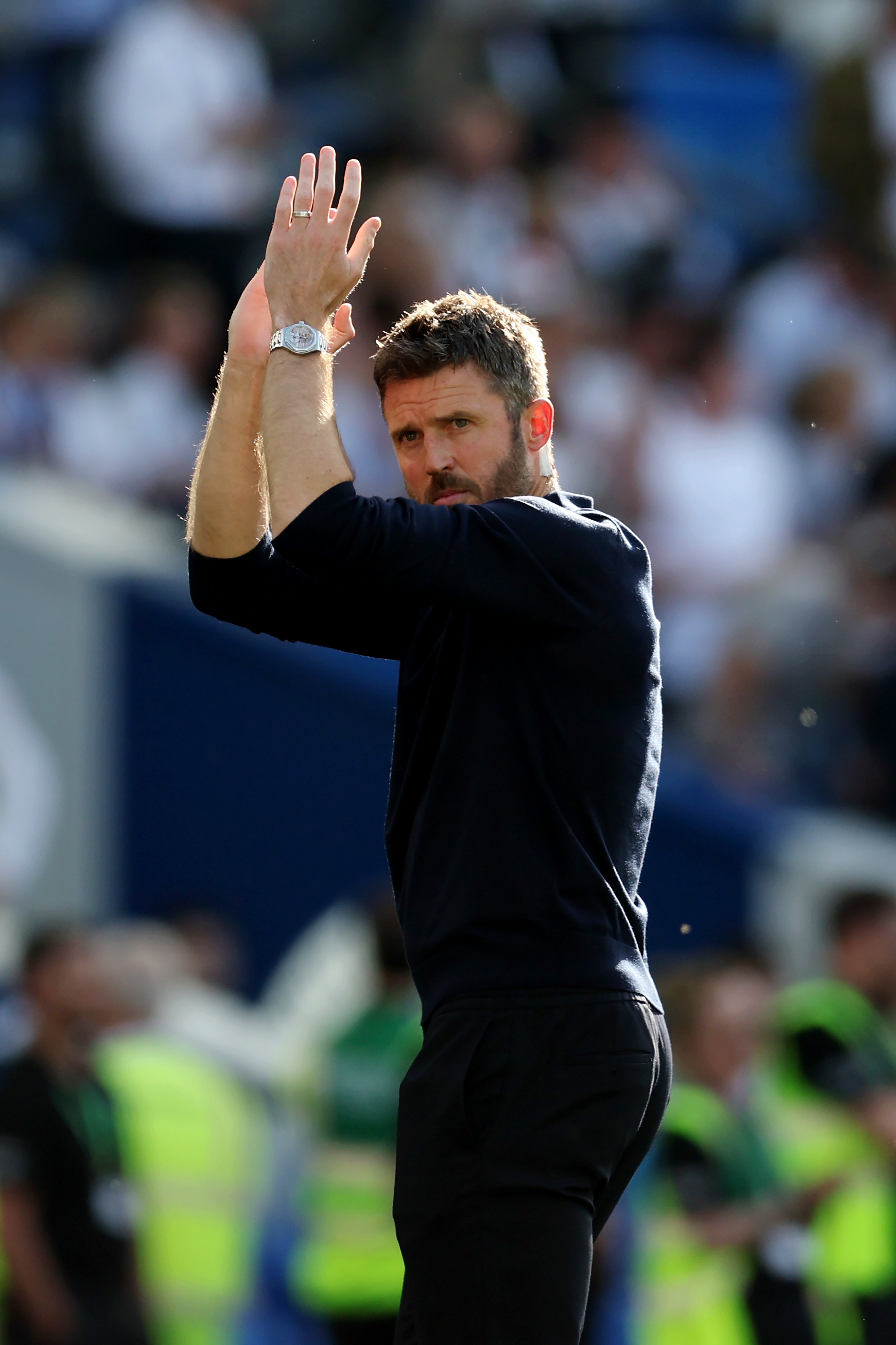 Image of Michael Carrick clapping fans after win away to Brighton | 24 May 2026