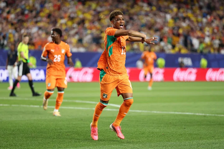Amad celebrates his goal v Ecuador