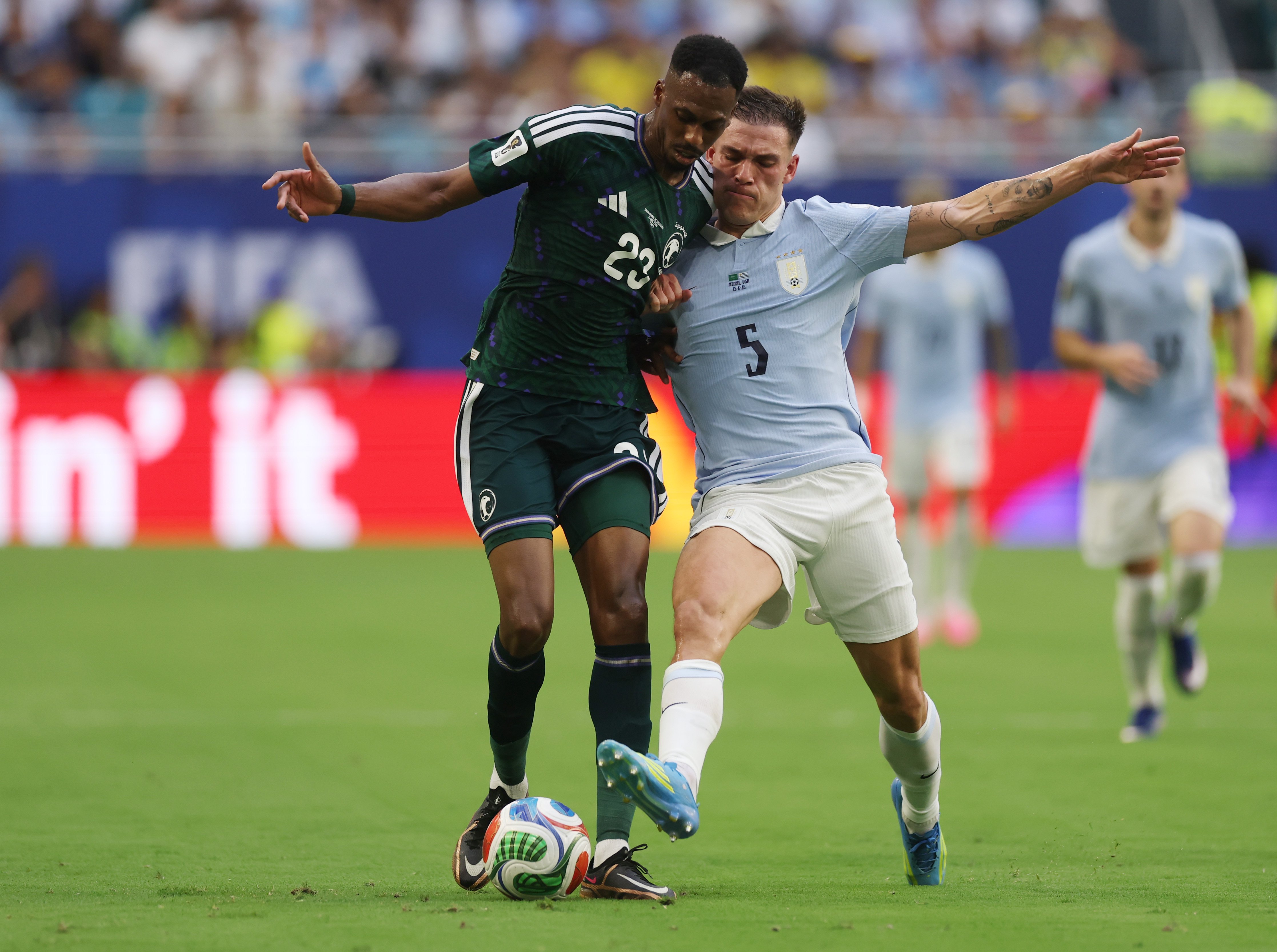 Manuel Ugarte makes a tackle