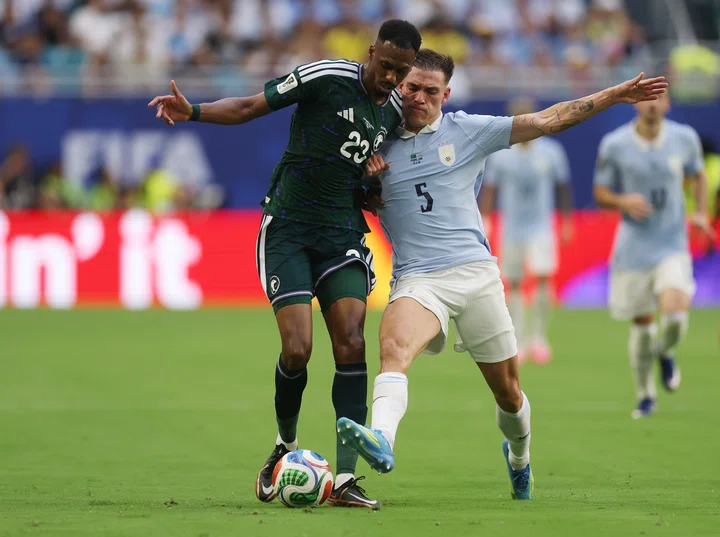 Manuel Ugarte makes a tackle
