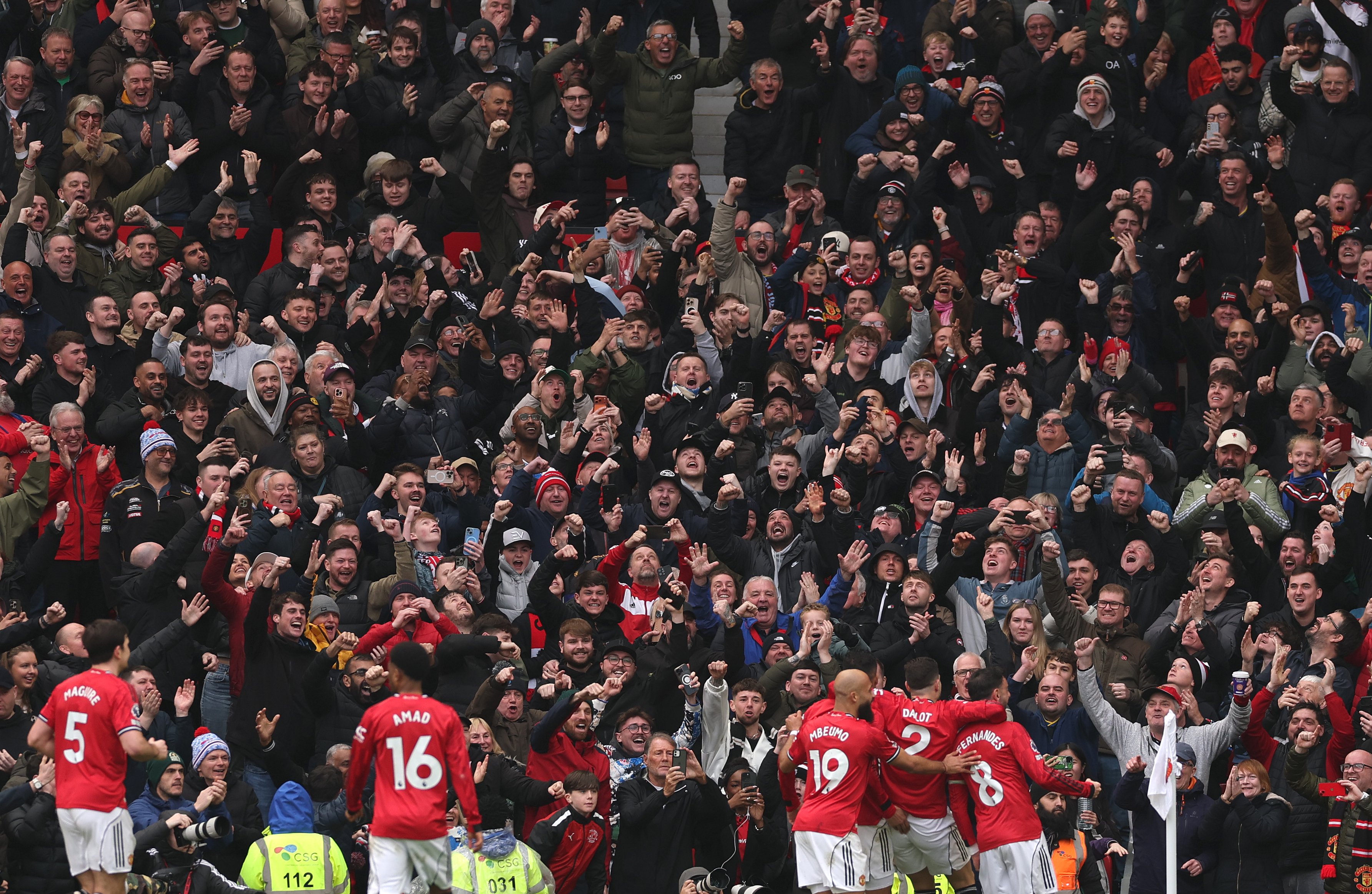 Manchester United fans celebrate second goal vs Aston Villa 25/26