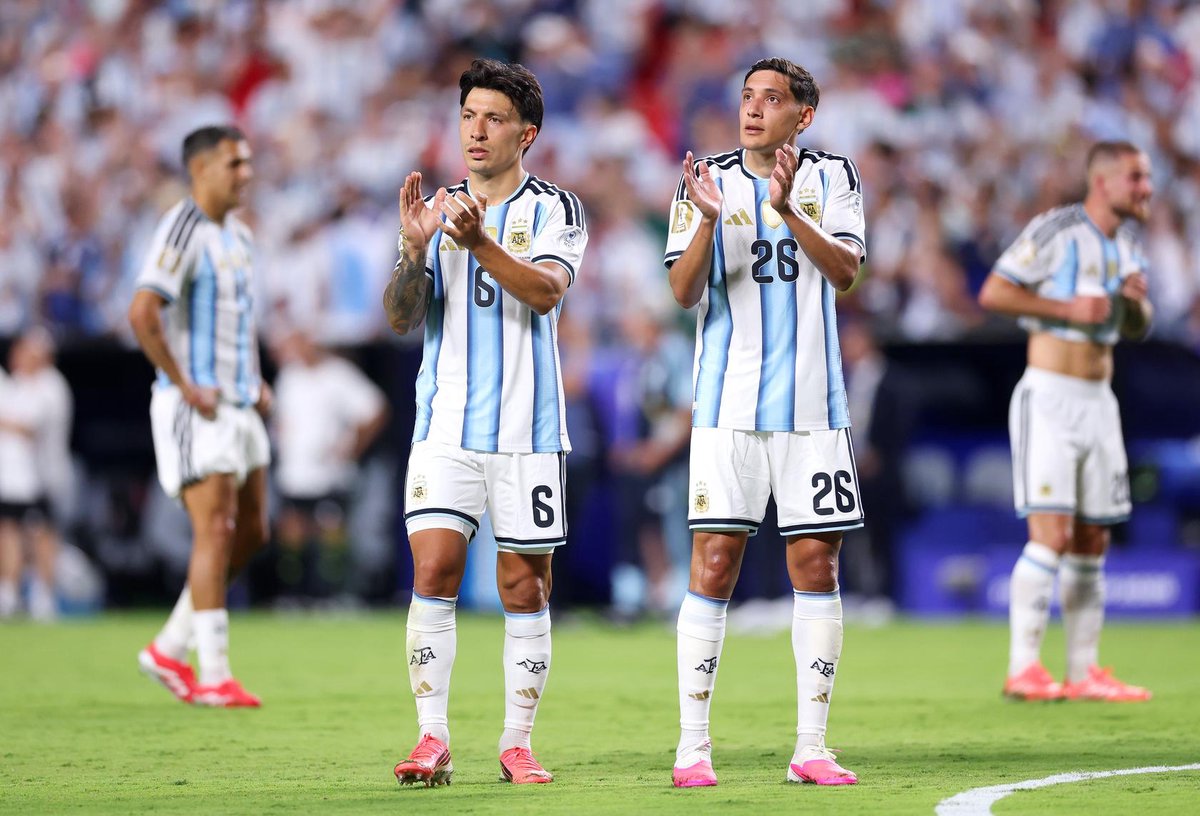 Martinez helps Messi-inspired Argentina win World Cup opener