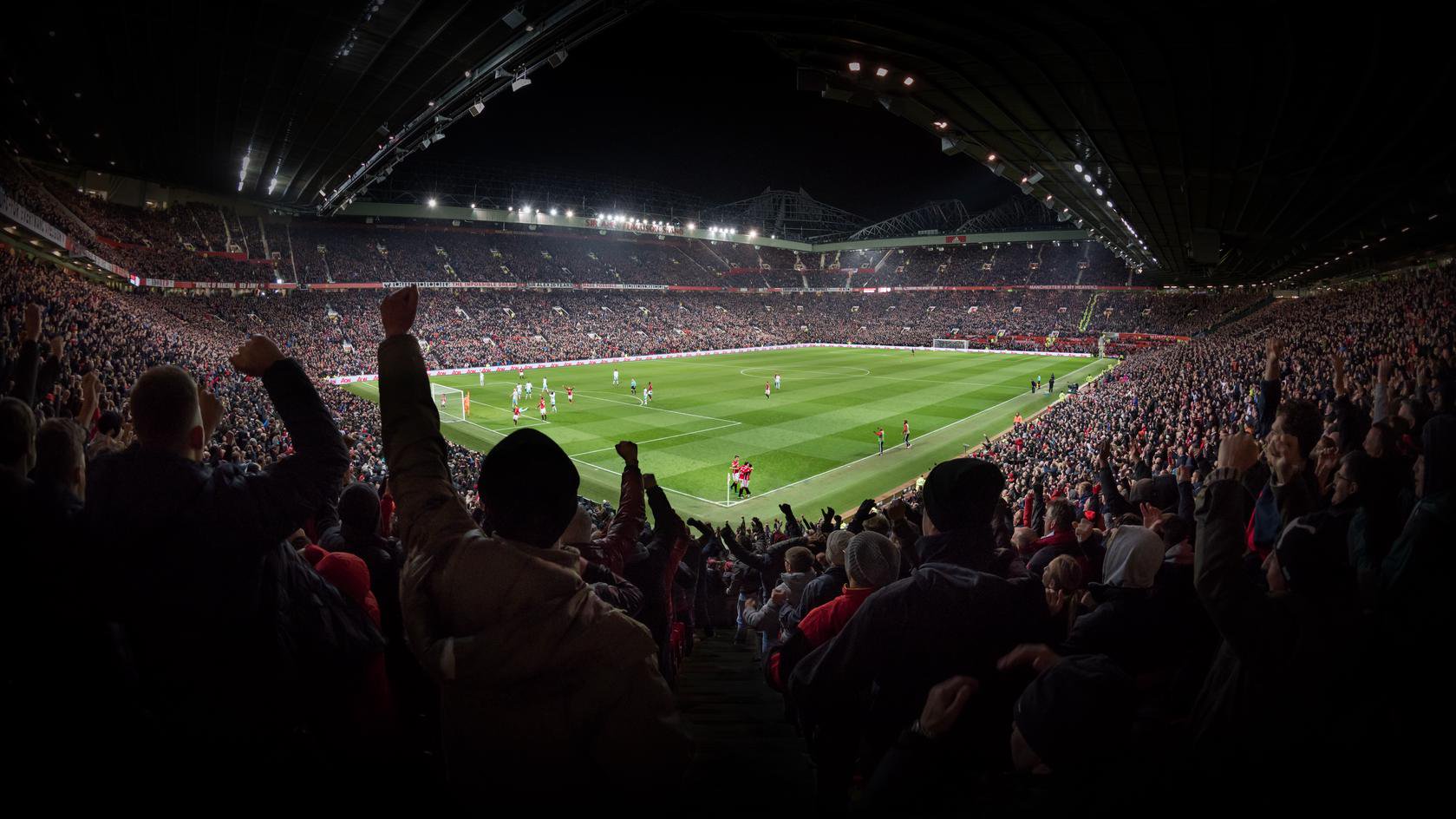 Old Trafford interior shot of stadium bowl at night