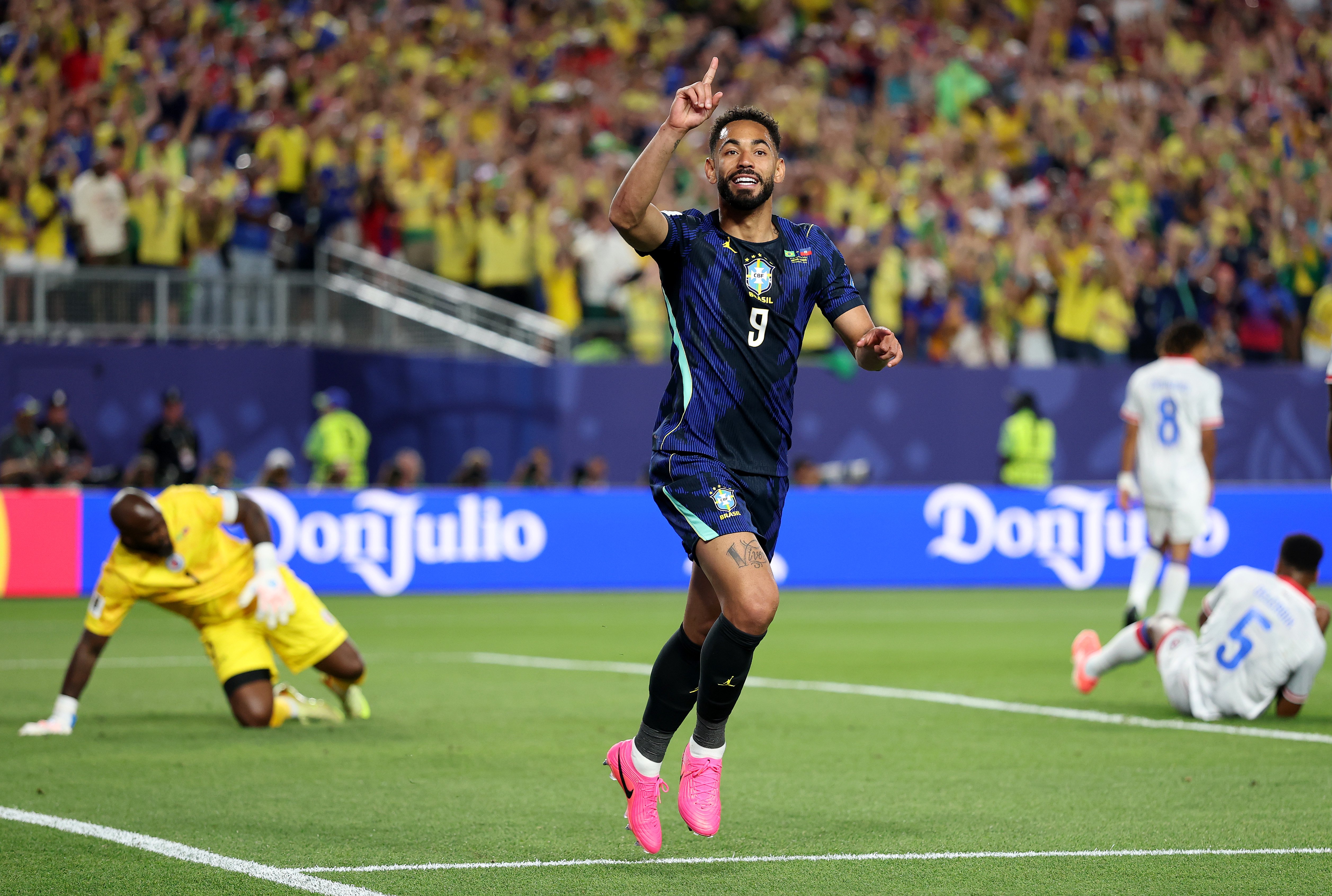 Matheus Cunha celebrates with arm in air after goal v Haiti | 2026 World Cup
