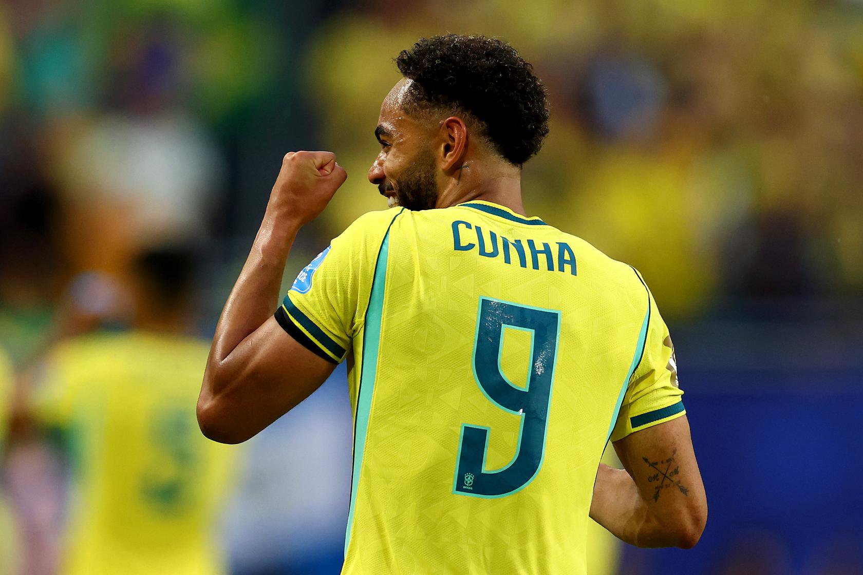 Matheus Cunha celebrates scoring vs Scotland