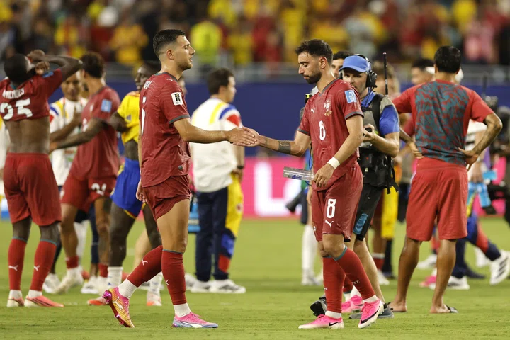 Diogo Dalot and Bruno Fernandes
