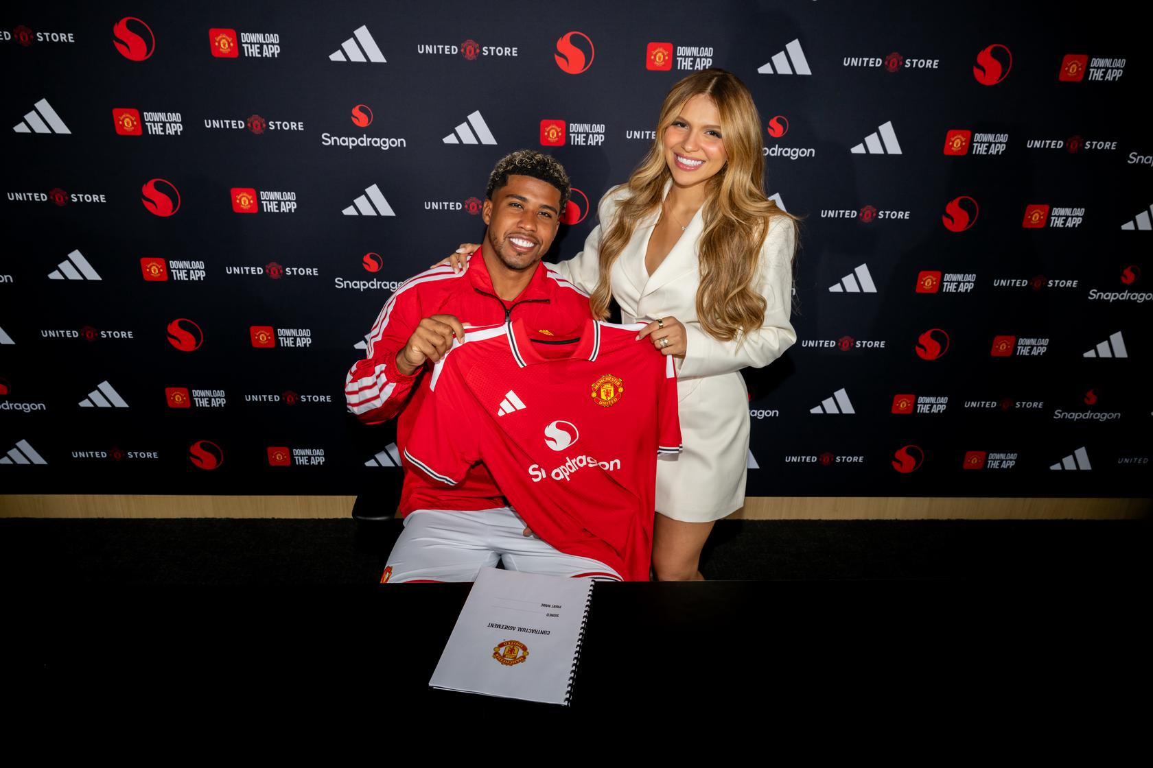 Andrey Santos with wife Yngryd at contract signing