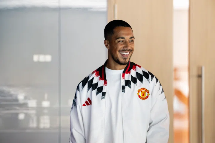 Youri Tielemans smiles at Carrington on Manchester United signing day