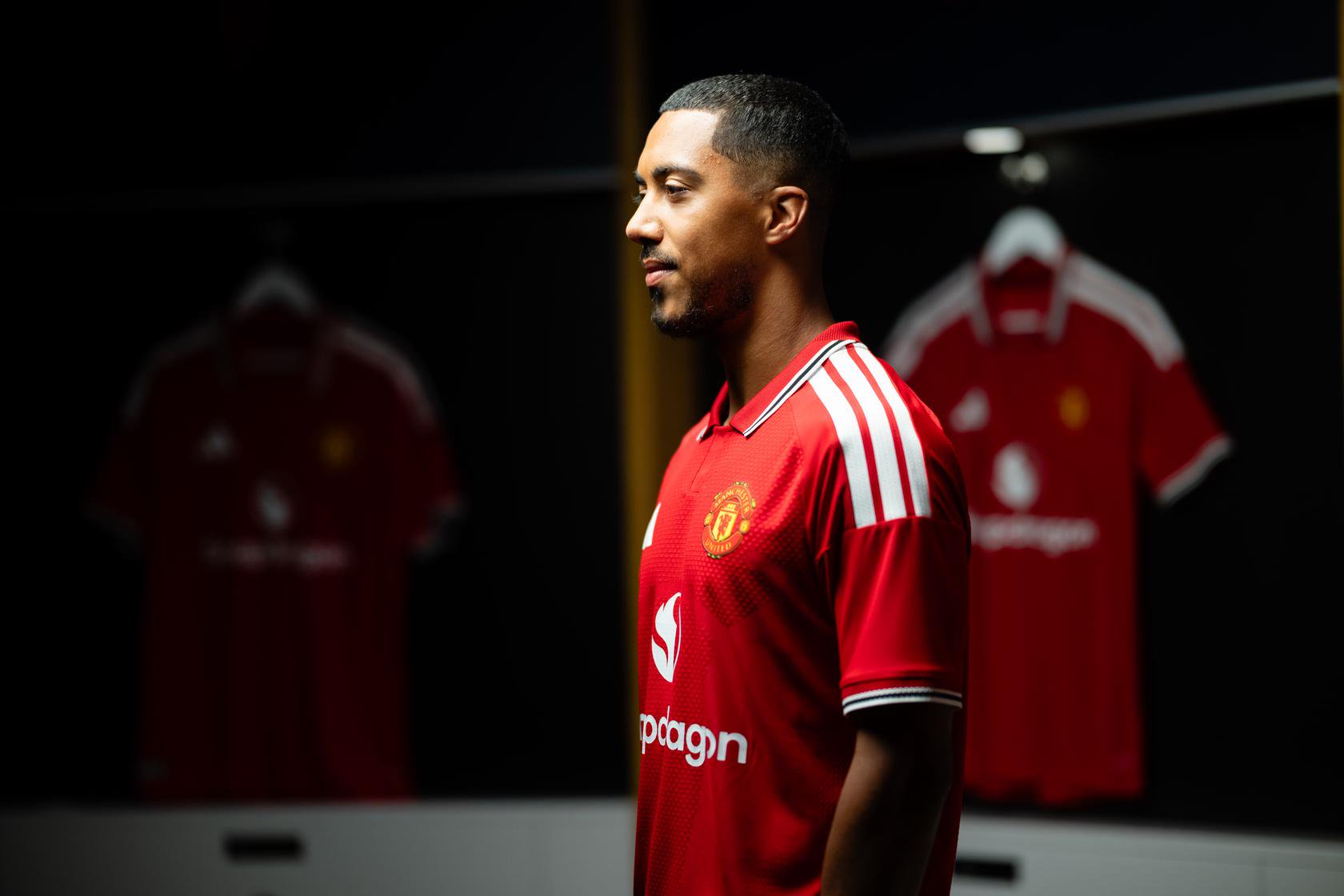 Side-on shot of Youri Tielemans looking forward in new United shirt
