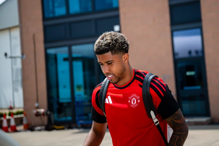 Andrey Santos looks downwards ahead of boarding flight
