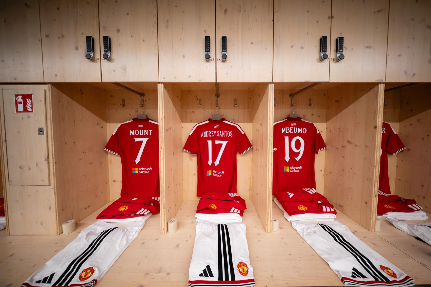Three shirts in dressing room leading on Santos
