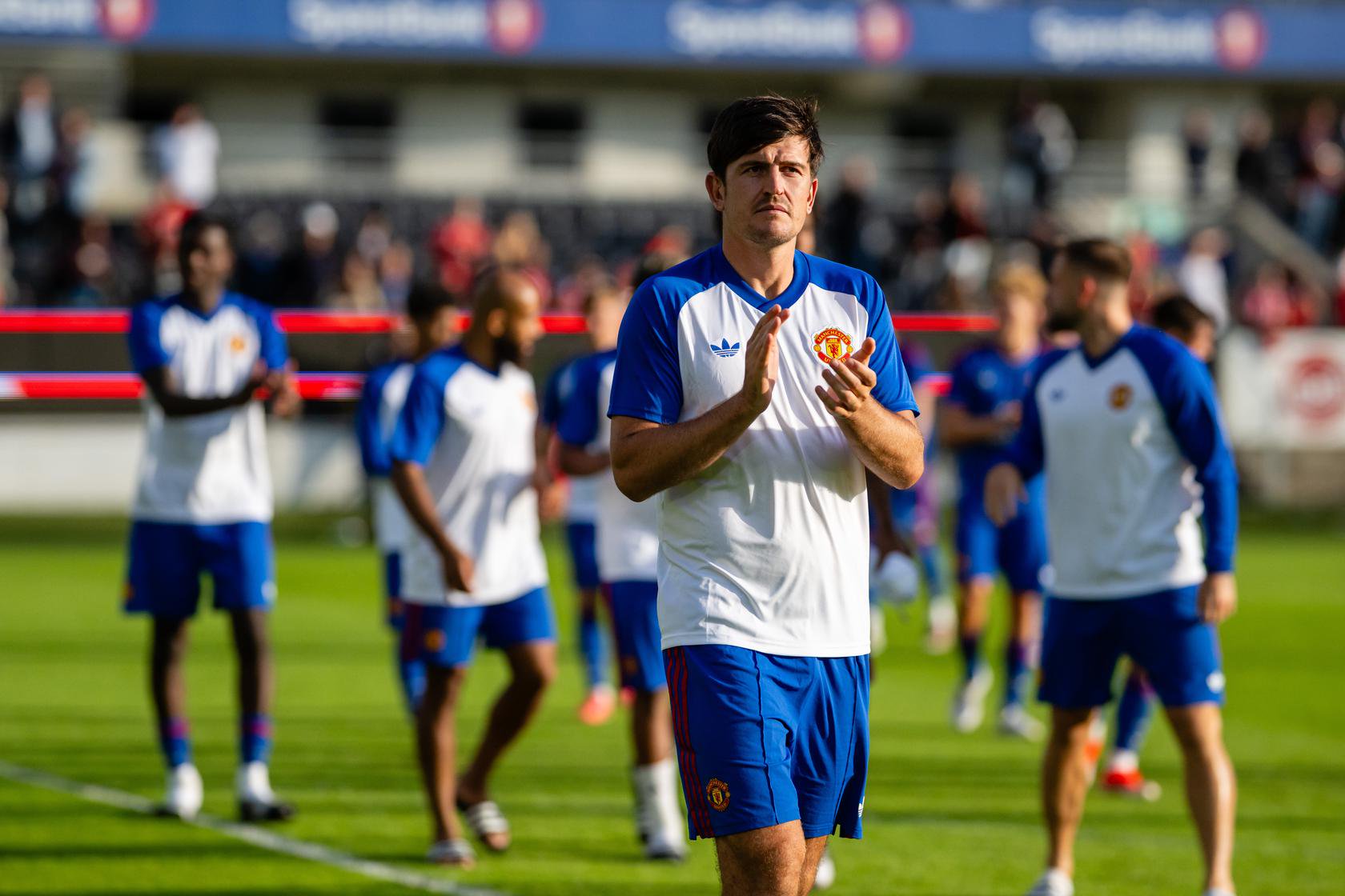 Harry Maguire applauds fans in Trondheim after Rosenborg victory
