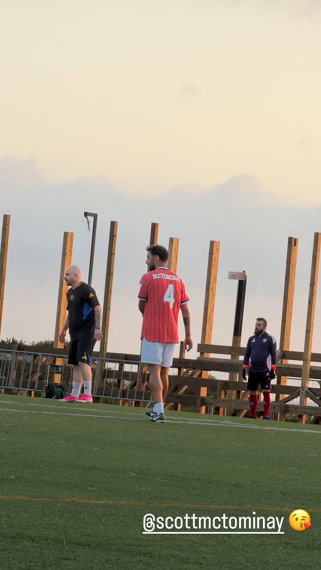 Bruno Fernandes wearing Scott McTominay Scotland shirt
