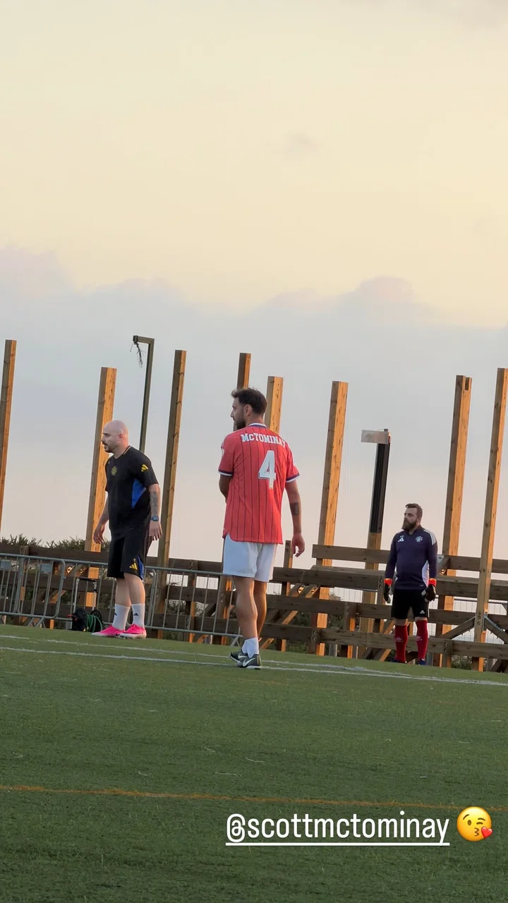 Bruno Fernandes wearing Scott McTominay Scotland shirt