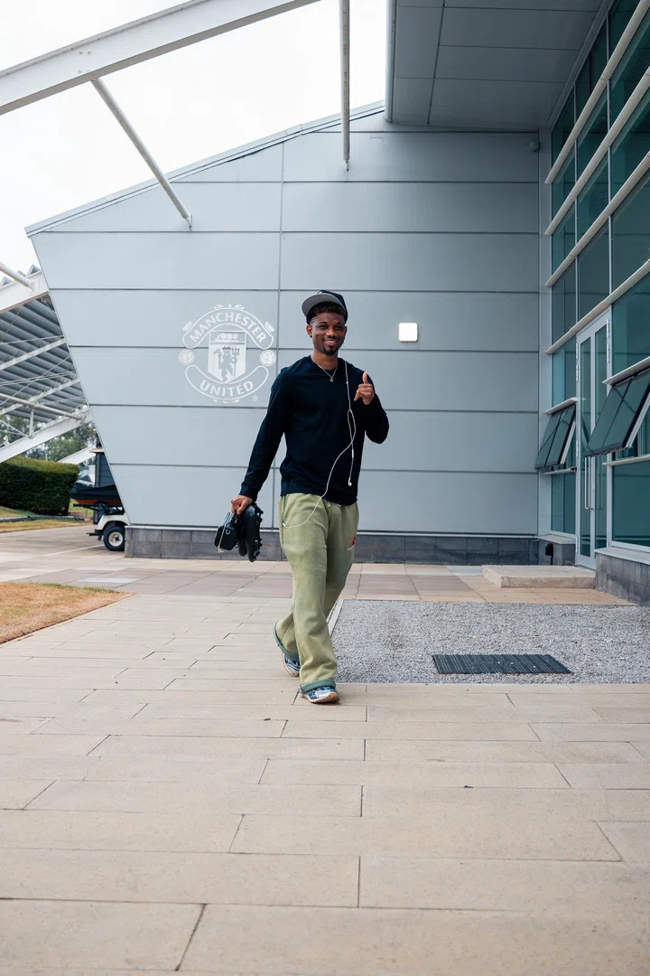 Amad thumbs up as he reports back to Carrington after World Cup