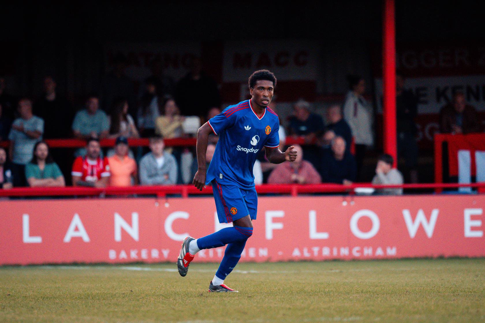 Reece Munro in the blue kit