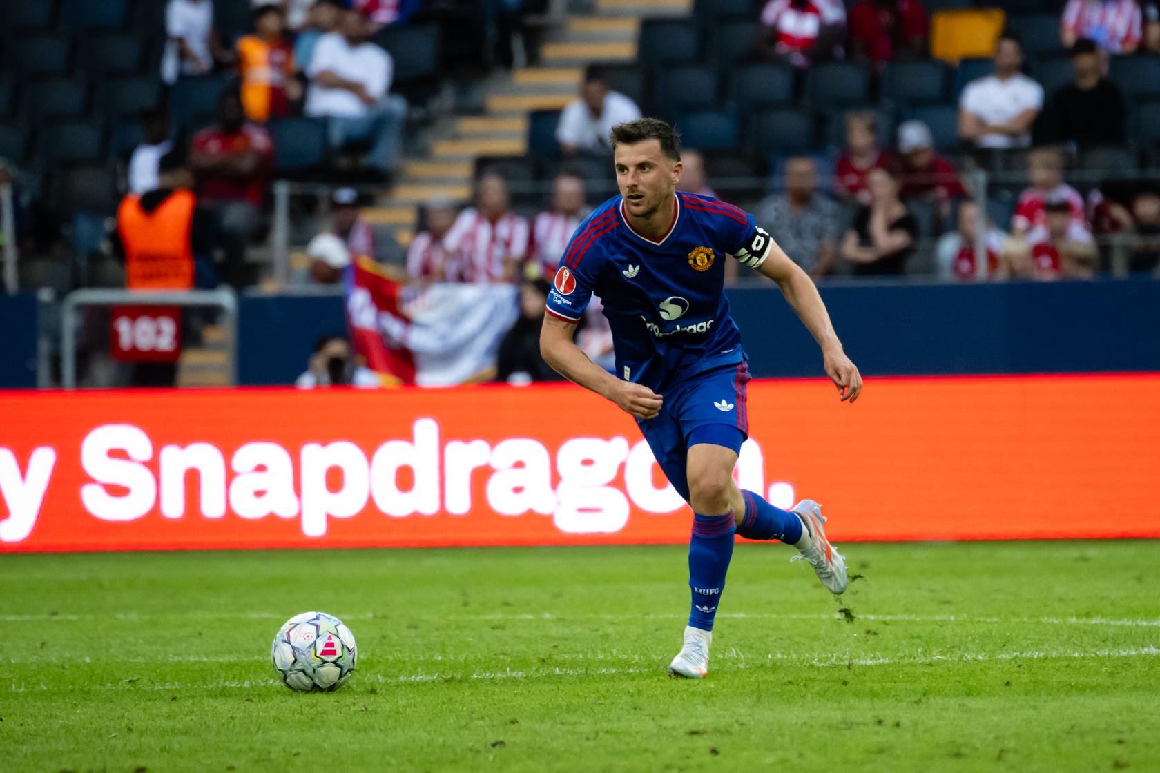 Mason Mount controls the ball against Atletico de Madrid