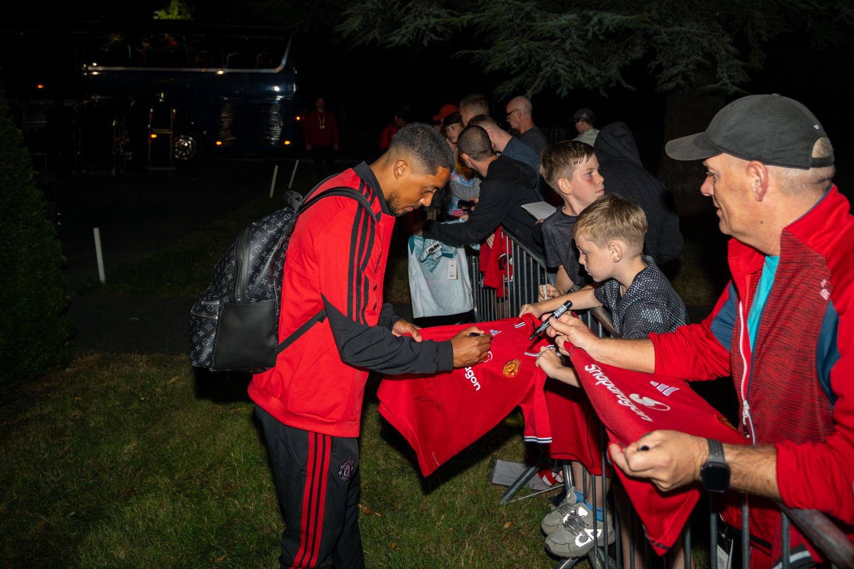 Youri Tielemans signs shirts for fans in Ireland