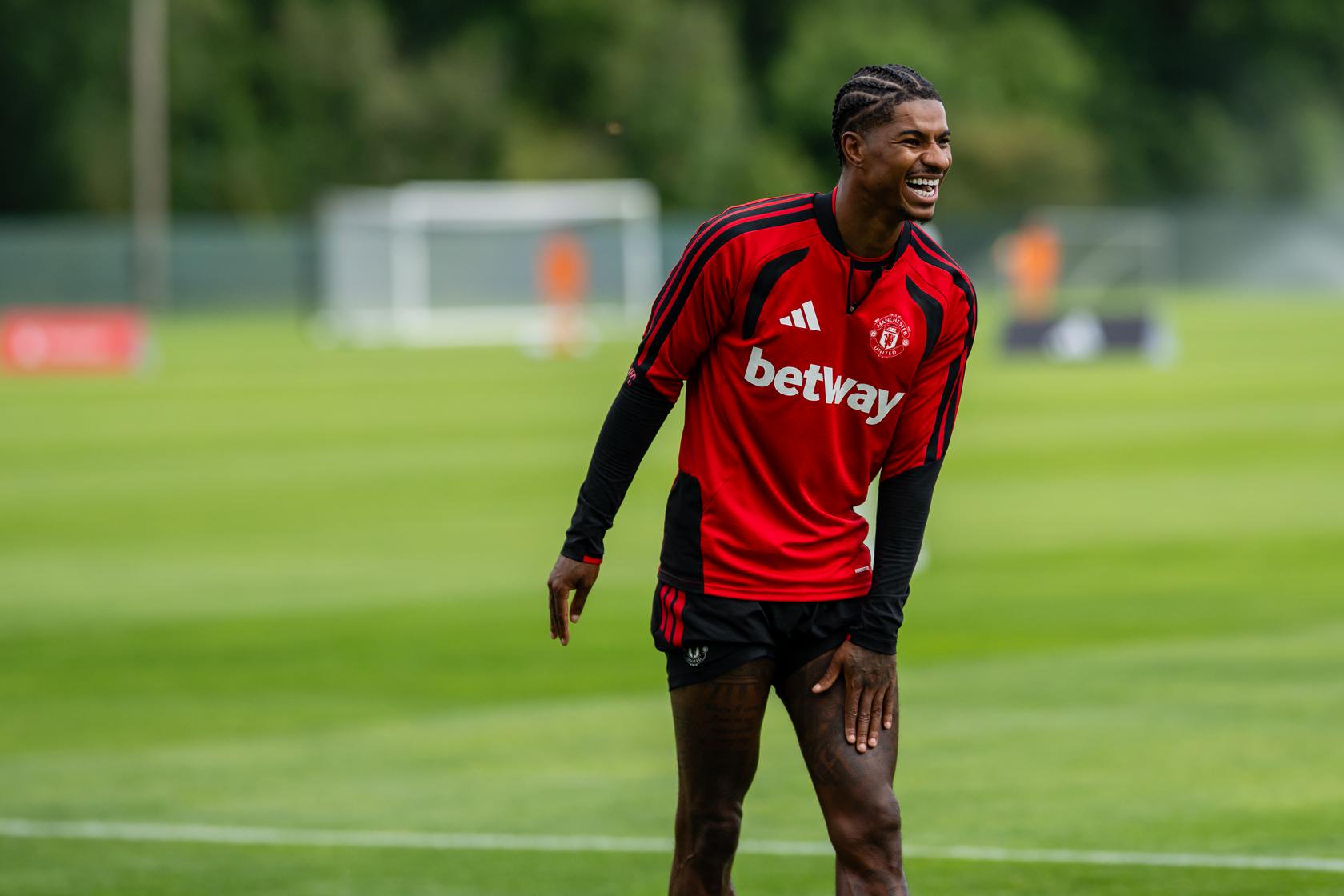 Marcus Rashford training and smiling during United pre-season in Ireland