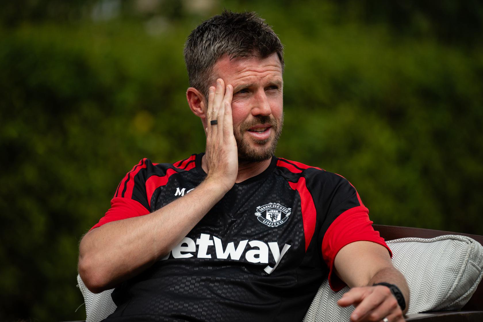 Michael Carrick hand on face