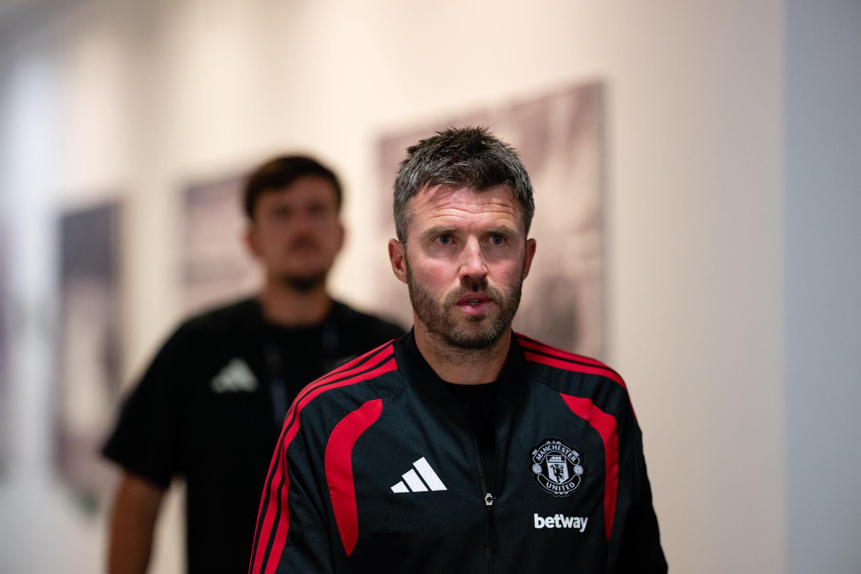 Michael Carrick walking into stadium in Poland before Milan fixture