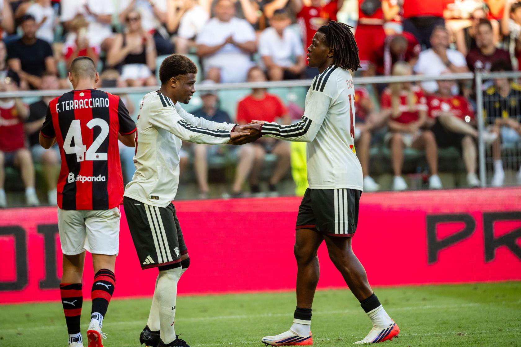 Amad and Patrick Chinazaekpere Dorgu celebrate v AC Milan in Wroclaw | 15 August 2026