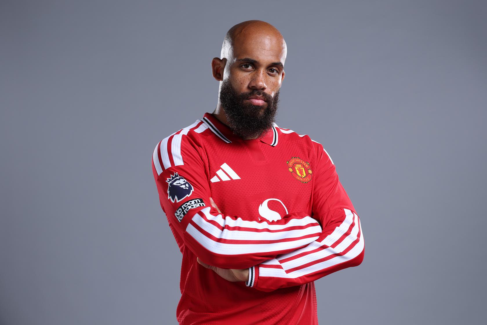Bryan Mbeumo looking mean in red shirt