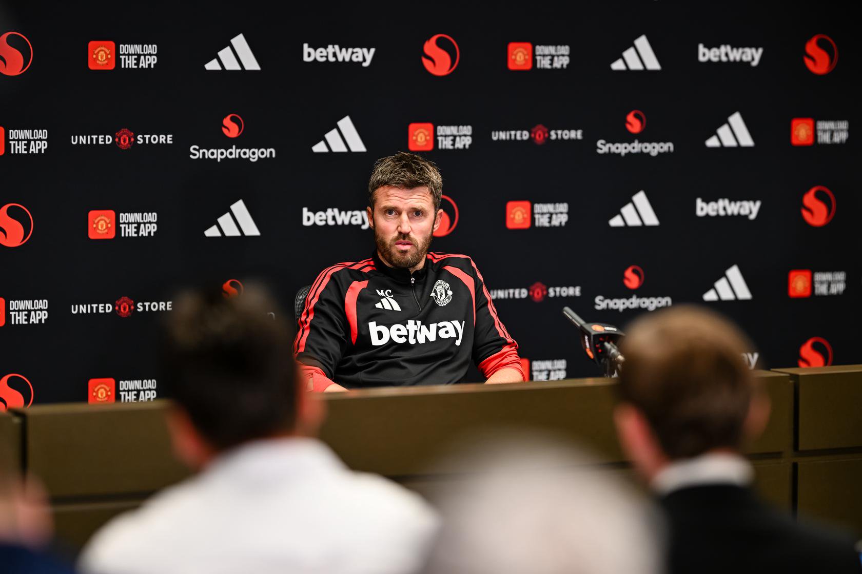 Michael Carrick sitting in press conference before Ipswich game