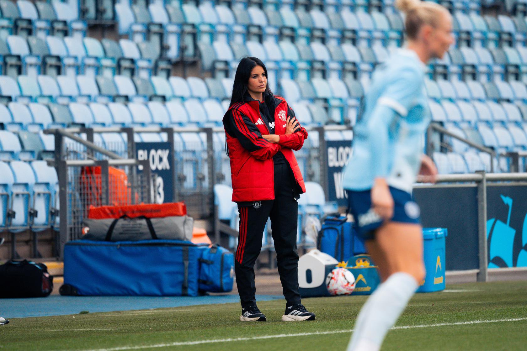 Eva Olid addressing team after friendly defeat to Man City