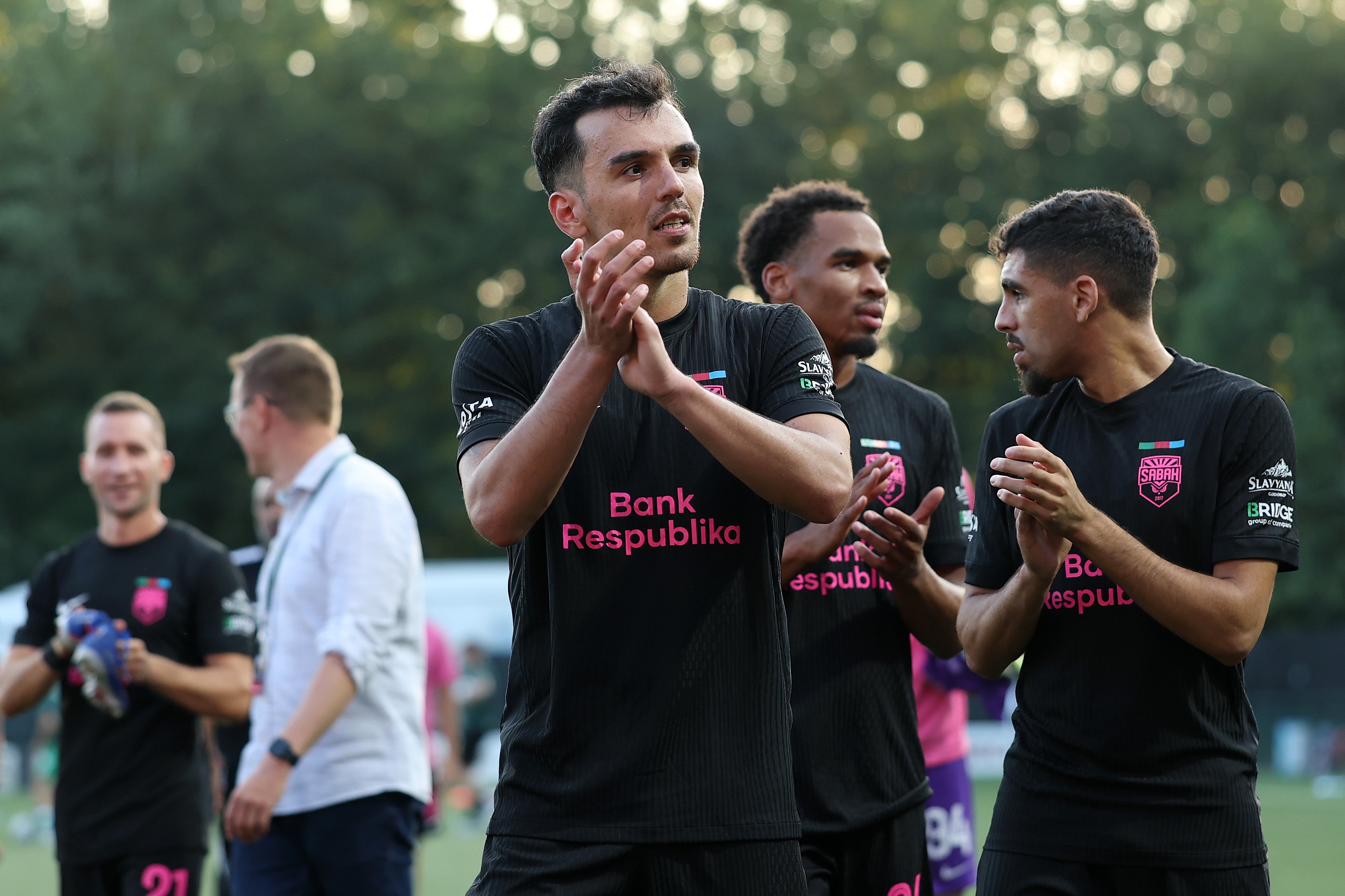 Sabah's Rahman Dashdamirov claps after beating New Saints