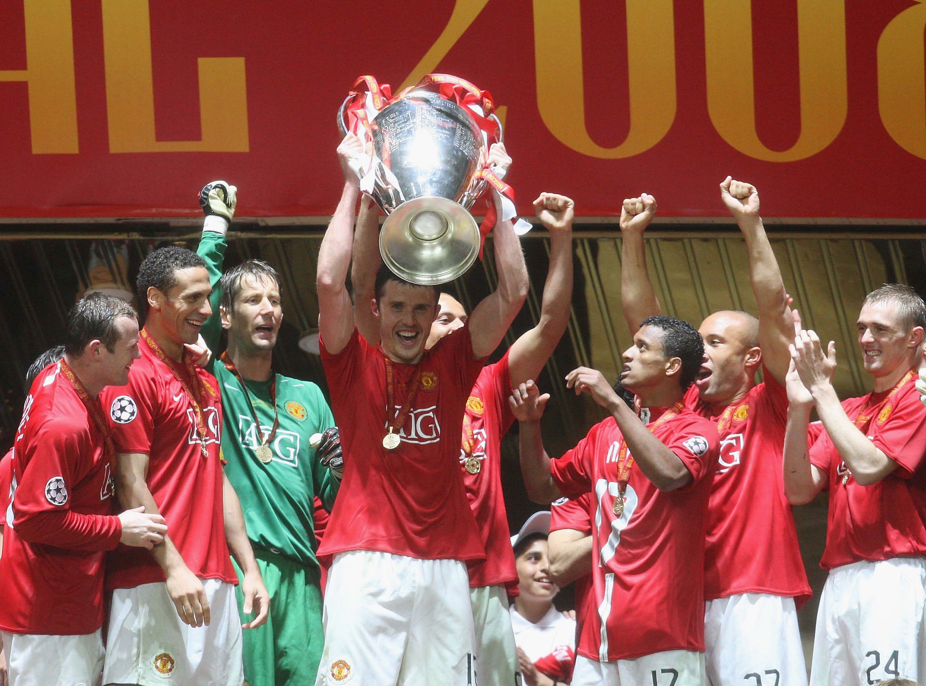 Michael Carrick lifts the European Cup aloft