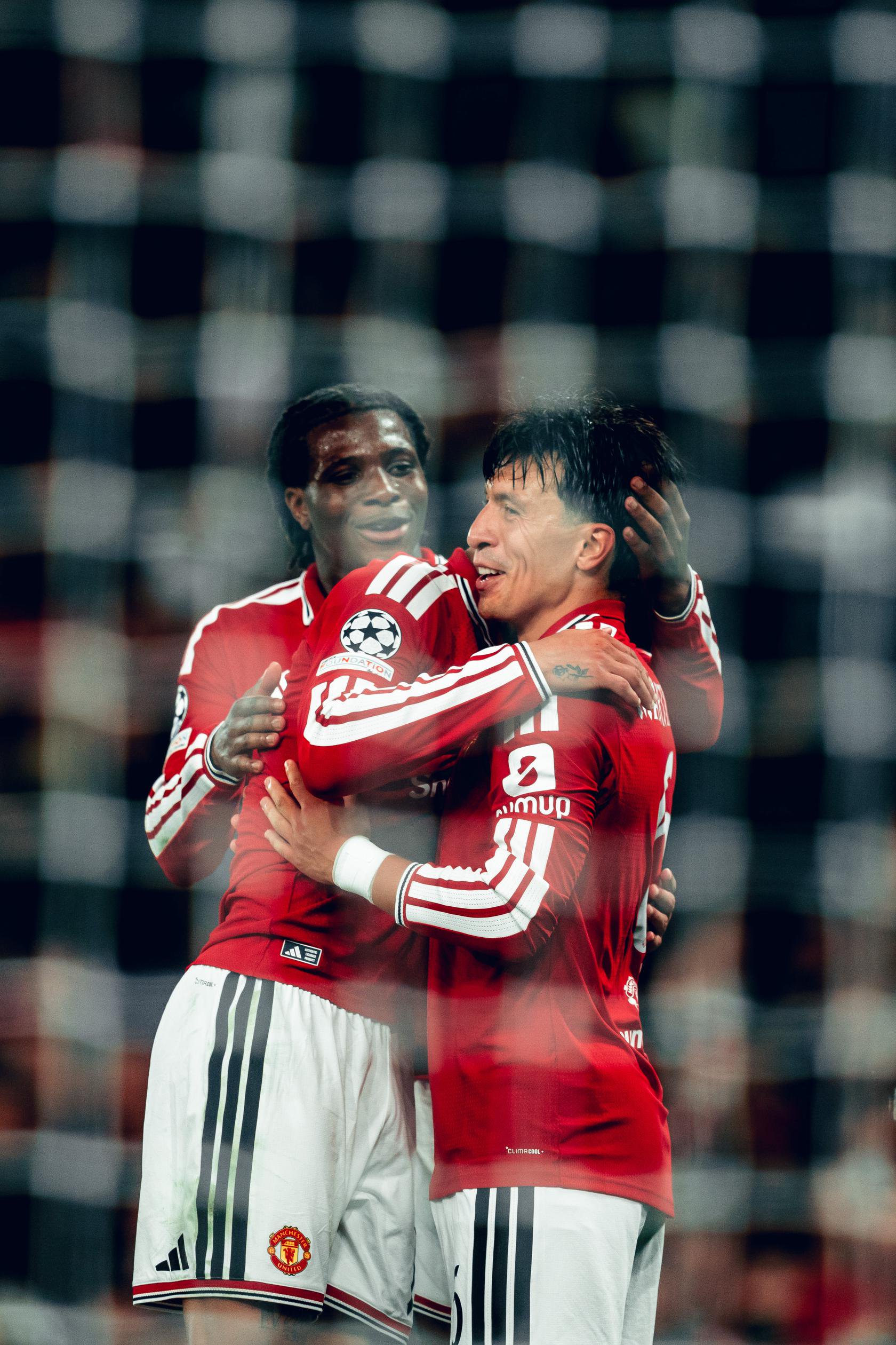 Lisandro Martinez celebrates goal for Man Utd v Sabah with Patrick Chinazaekpere Dorgu