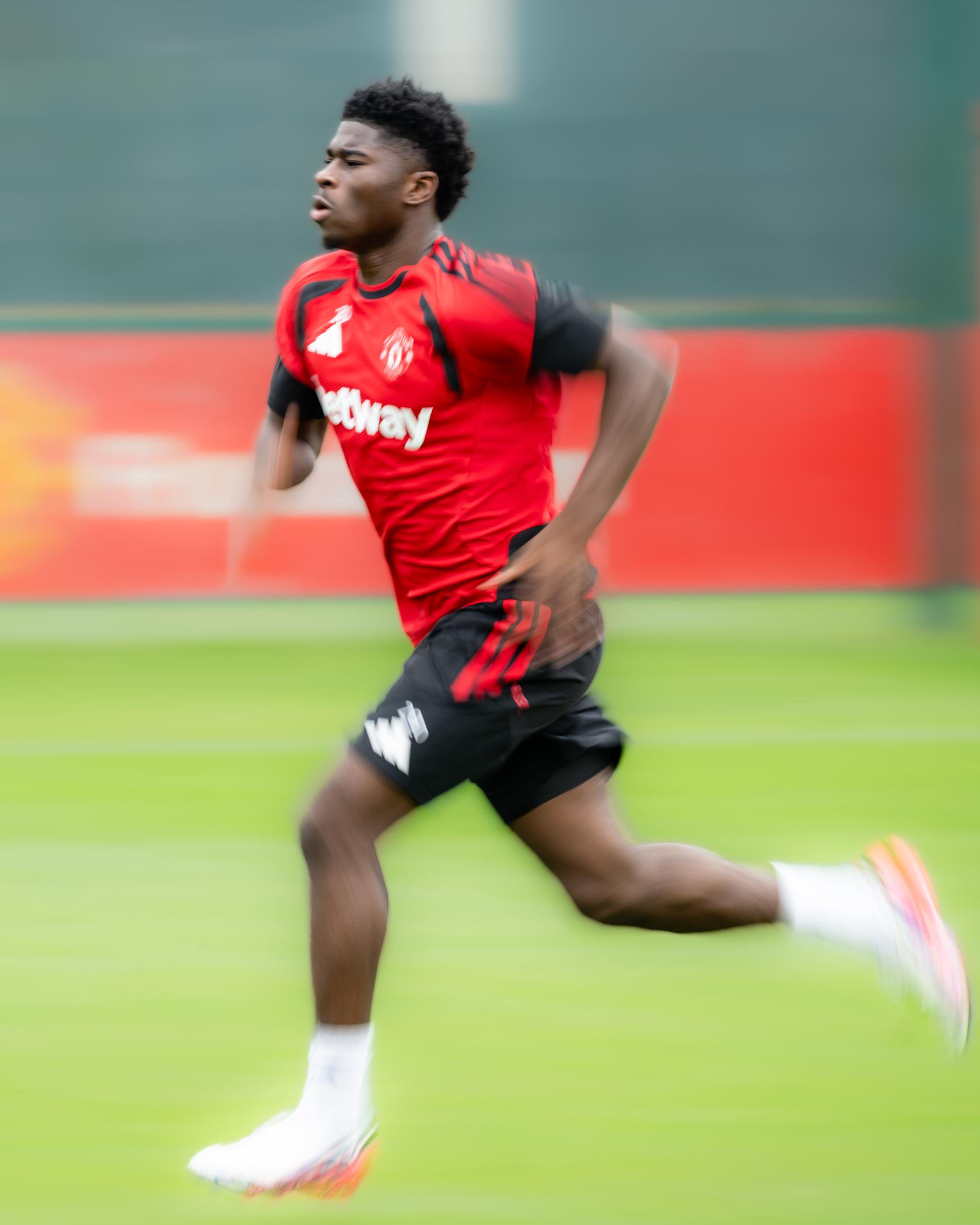Carlos Baleba sprints at Carrington