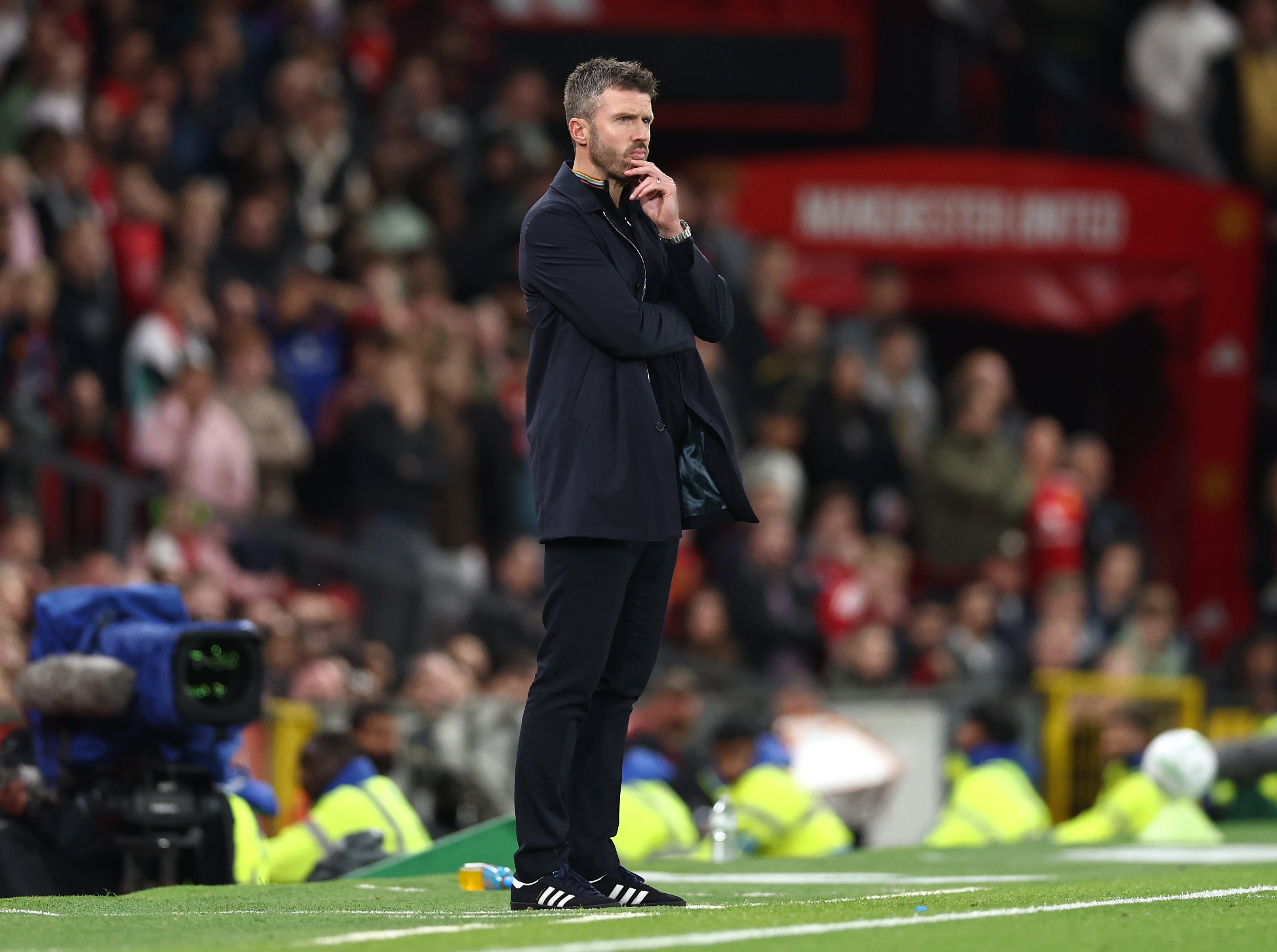 Michael Carrick watches on from the sidelines against Brighton