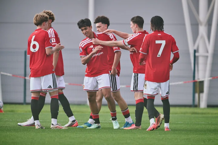 Jariyah Shah celebrates with team-mates after scoring v Wolves
