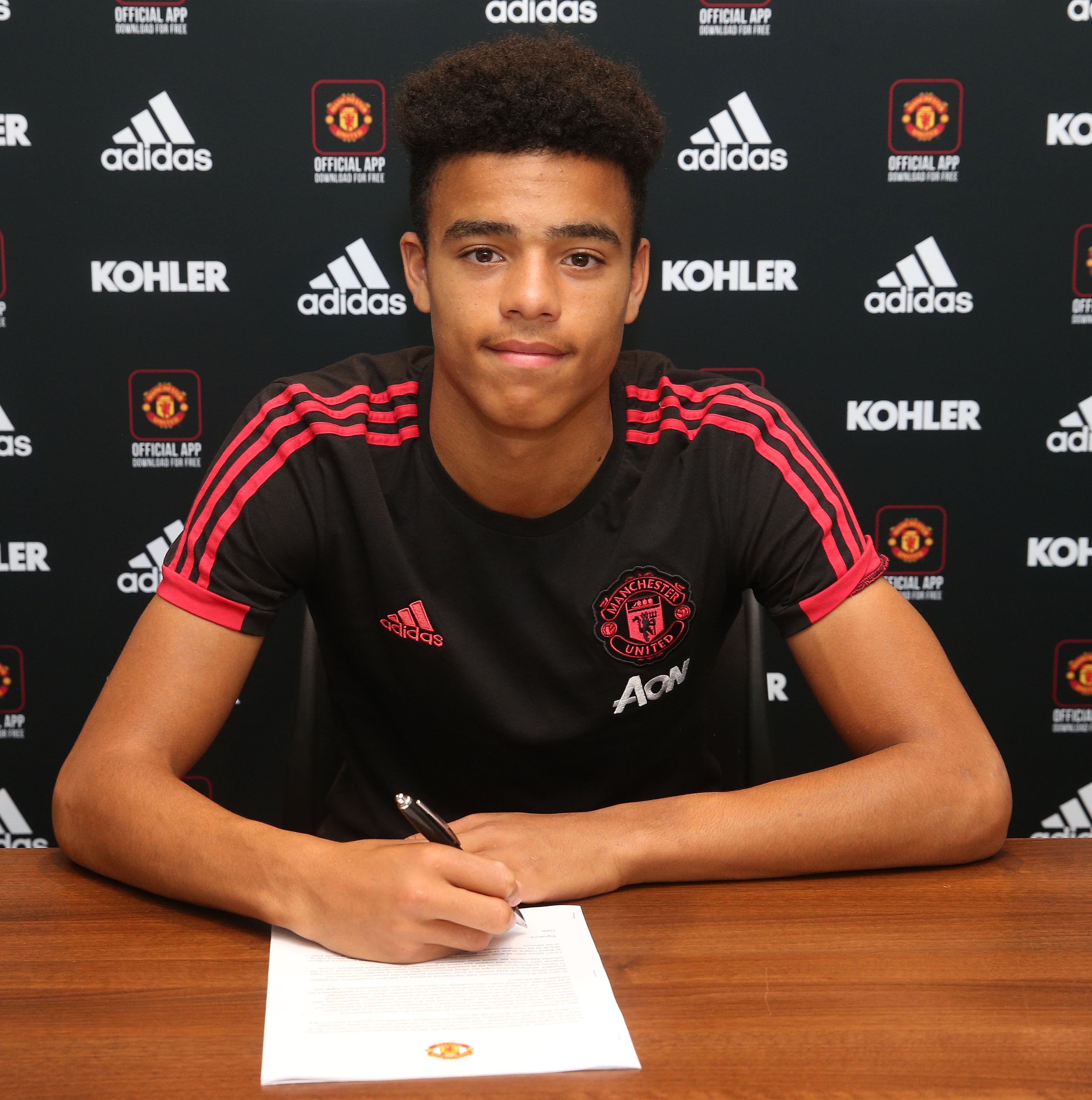 Greenwood signs professional contract