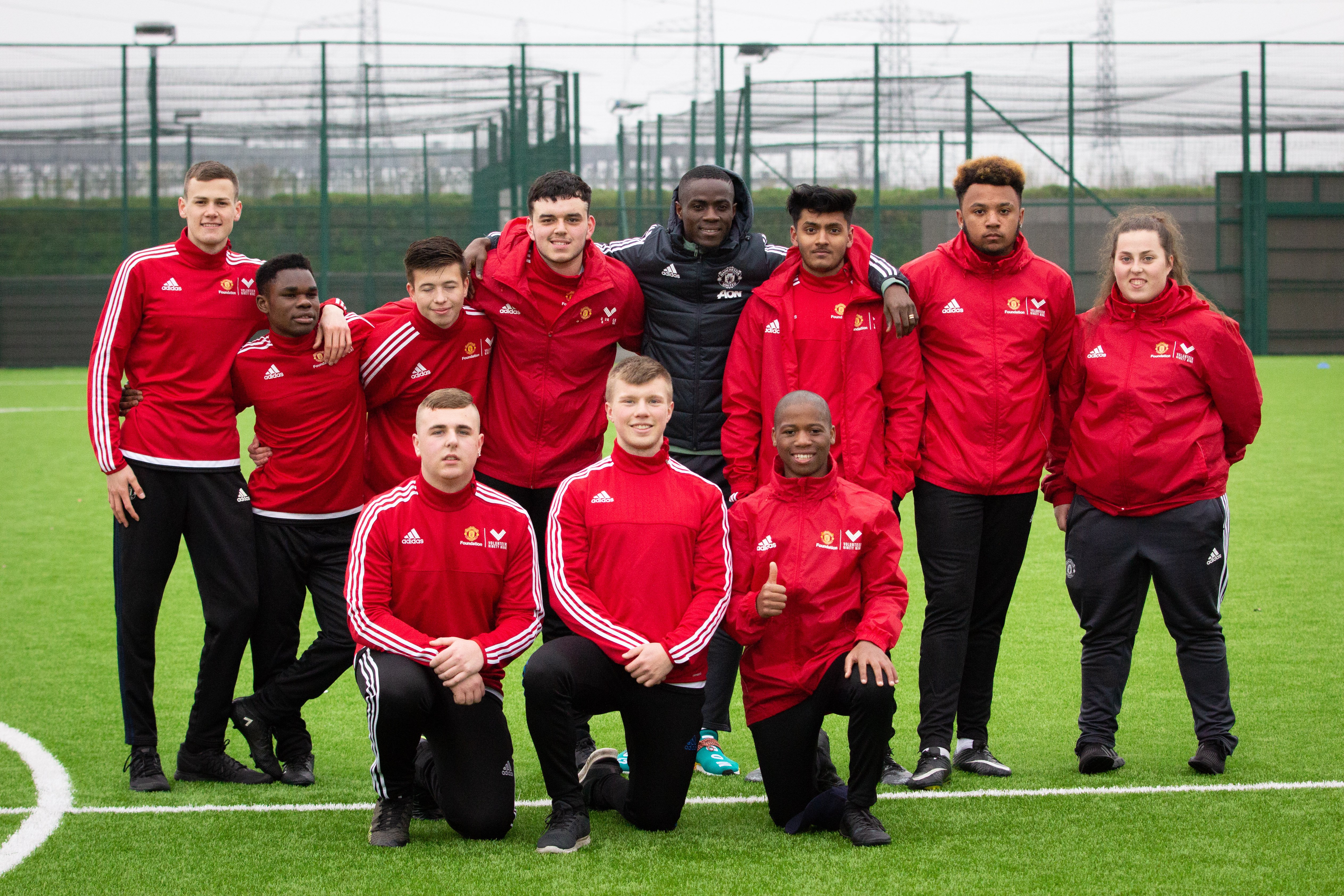 Young volunteers meet their United heroes 