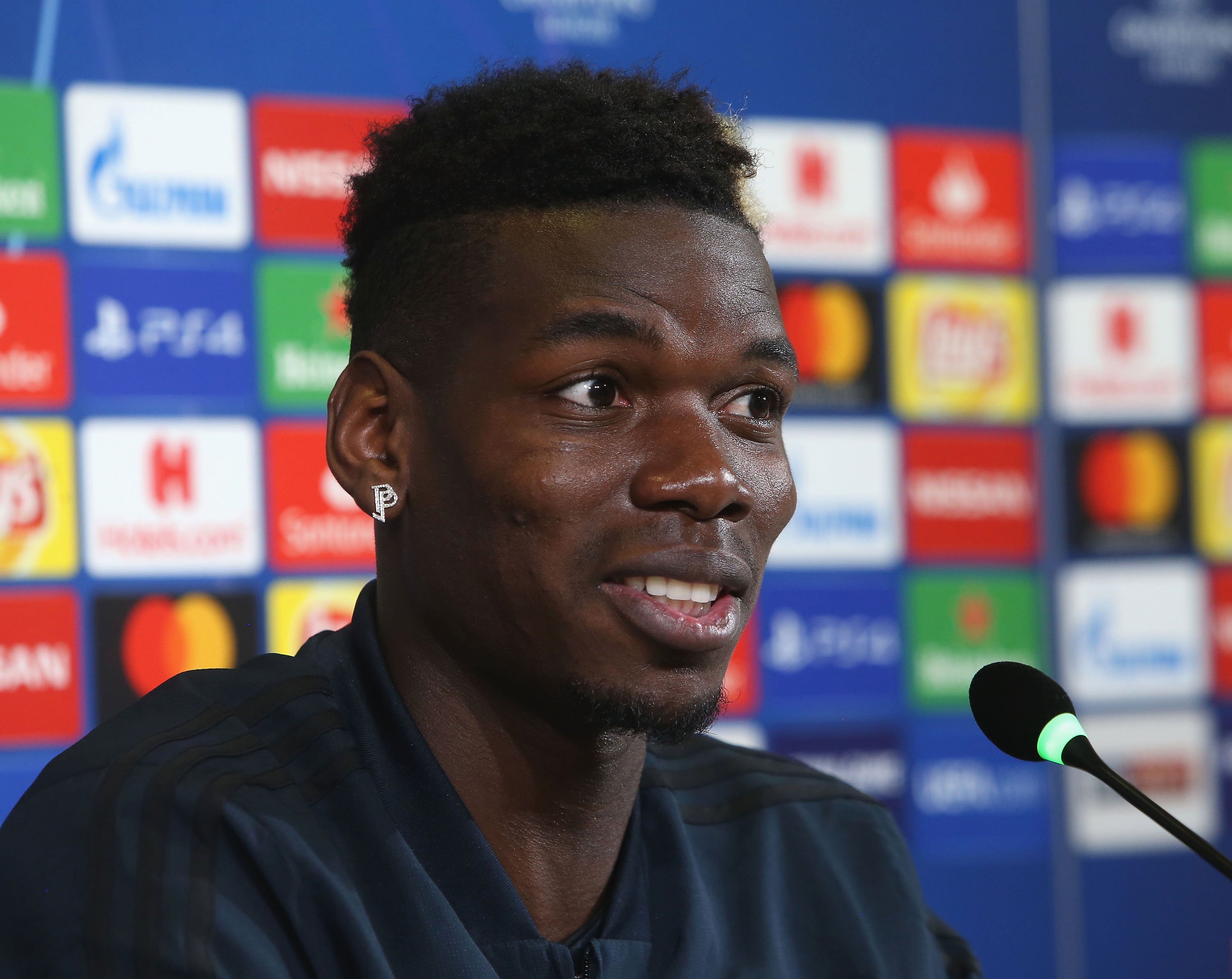 Pogba happy at United